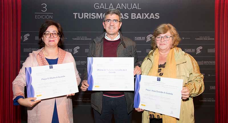 A este evento acudieron en representación municipal el Alcalde da Guarda, Antonio Lomba; la Concejal de Turismo, Montserrat Magallanes y la Concejal de Servicios Sociales, Teresa Vicente, donde recogieron los diplomas y carteles del distintivo SICTED para la Oficina de Turismo Municipal de A Guarda y las Prayas de O Muíño y Area Grande.